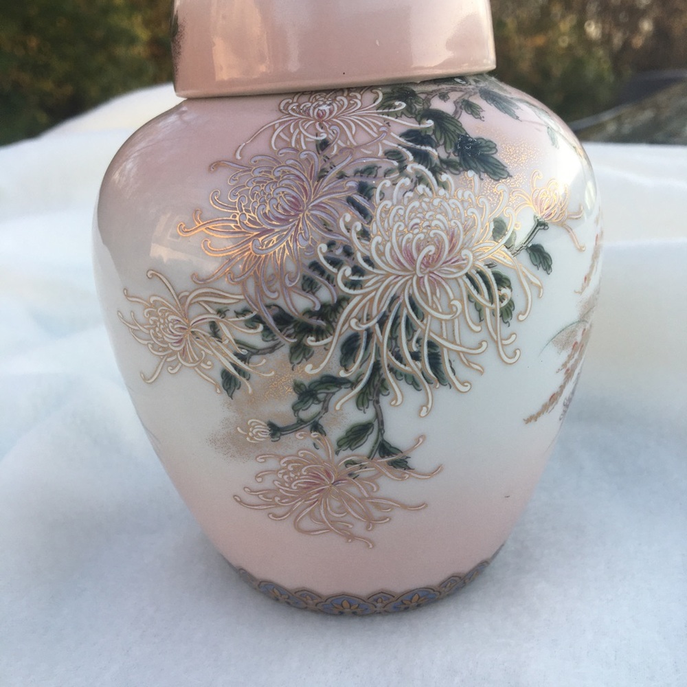 Vintage Kyoto ginger jar with flowers and butterflies.